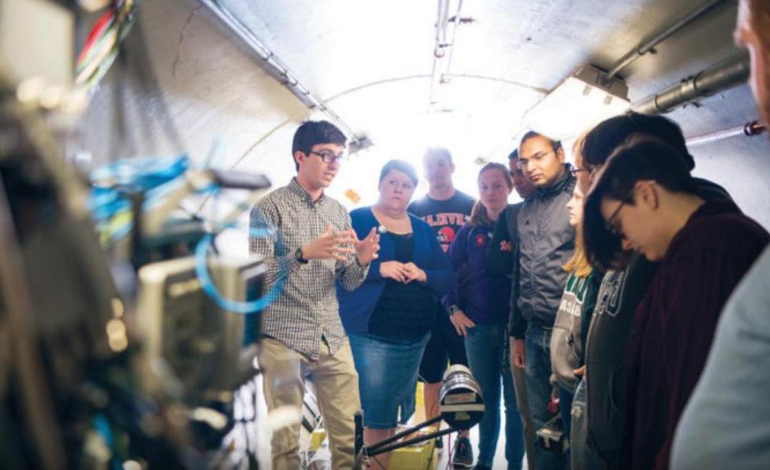Dr. Zach Meisel and students in the time-of-flight tunnel at the Edwards Accelerator Lab, located on campus.